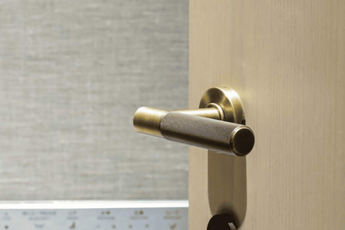 knurled door handles on round rose with diamond grip and satin gunmetal finish