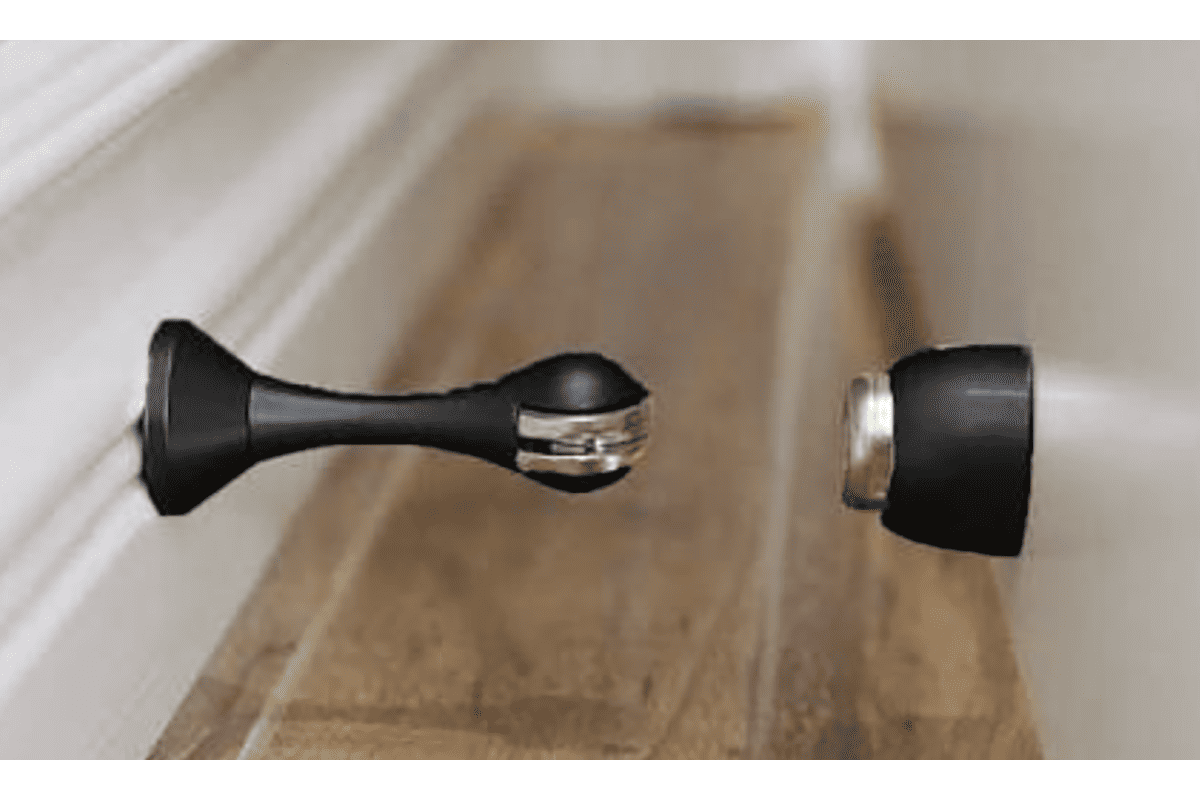 Magnetic door stops preventing door slamming magnetic door stops preventing wind-driven door slamming