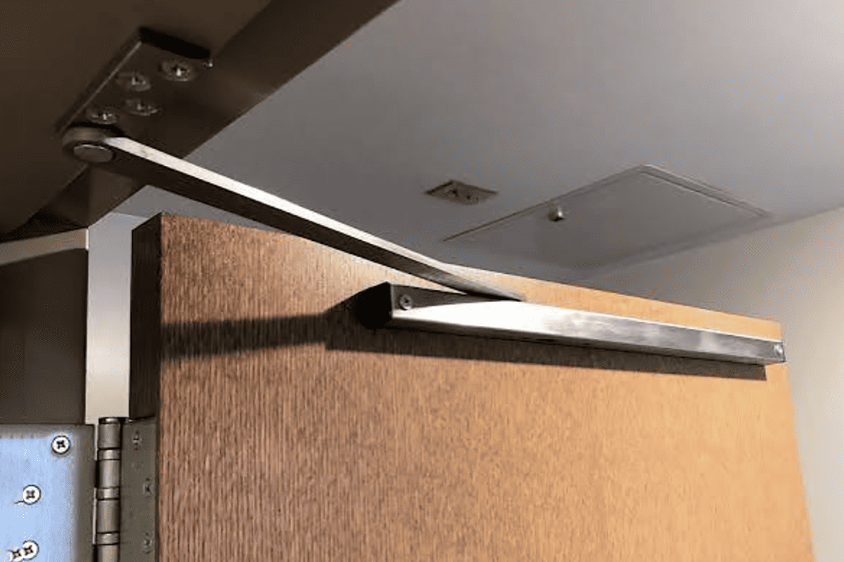 overhead door stops and holders controlling door opening angle