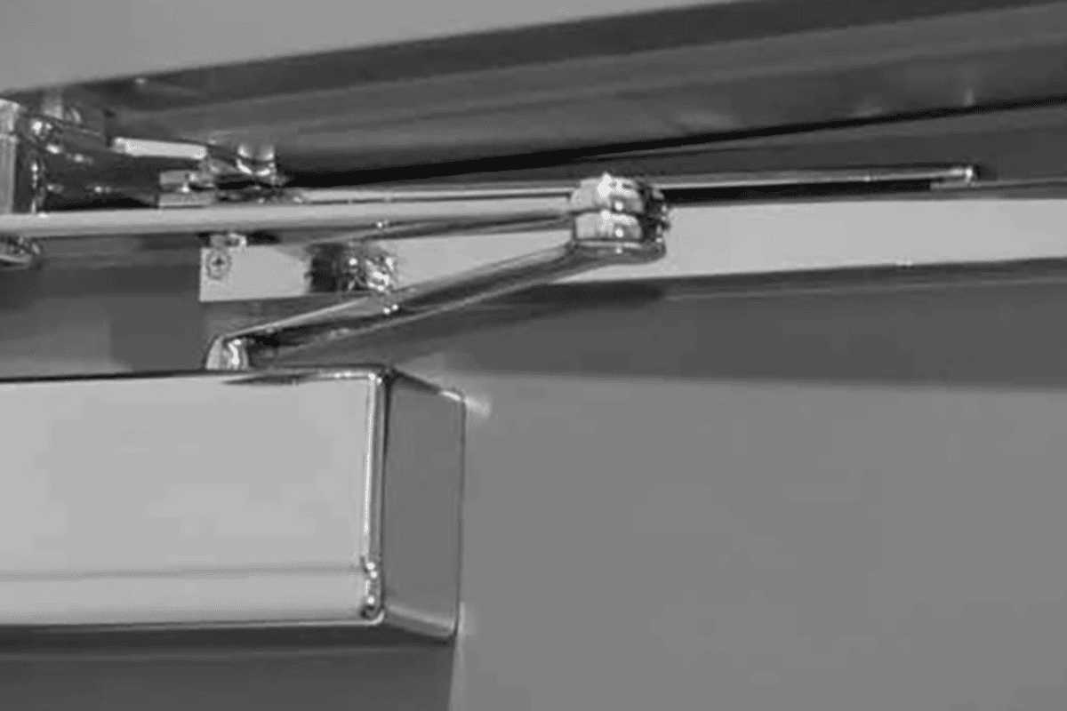 types of overhead door stops and holders for commercial doors